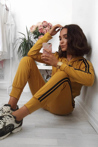 Black tracksuit with yellow 2024 stripe