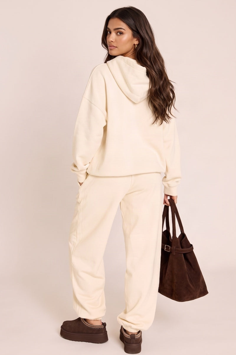Cream Rebellious Logo Jersey Jogger Trousers - Isobelle