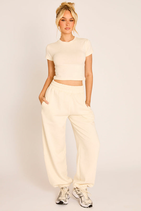 Cream Rebellious Logo Jersey Jogger Trousers - Isobelle
