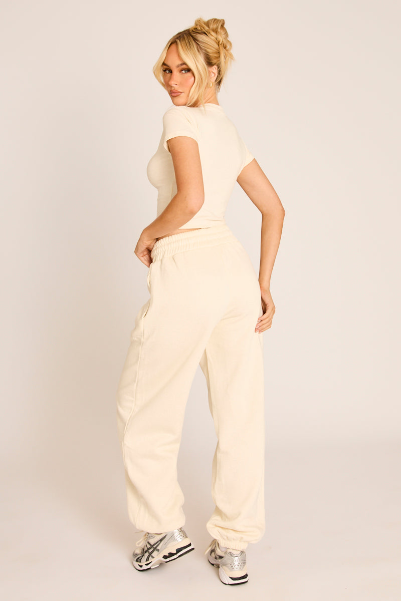 Cream Rebellious Logo Jersey Jogger Trousers - Kynee