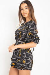 Black Chain Print Ruffle Sleeve Playsuit - Parrish-Playsuits