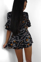 Black Chain Print Ruffle Sleeve Playsuit - Parrish-Playsuits
