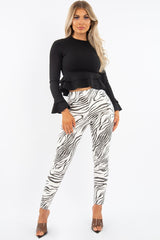 Black Peplum Frill Long Sleeve Top - Fari-Tops