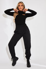 Black Ribbed Double Cut Out Top - Gena-Tops