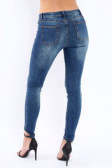Blue Denim Stud And Eyelet Ring Dip Hem Skinny Jeans - Lesha-Jeans