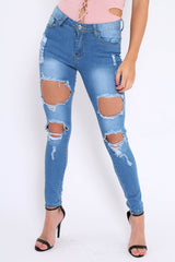 Light Blue Distressed Extreme Cut Out Skinny Jeans - Lilie-Jeans
