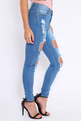 Light Blue Distressed Extreme Cut Out Skinny Jeans - Lilie-Jeans