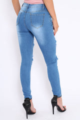 Light Blue Distressed Extreme Cut Out Skinny Jeans - Lilie-Jeans